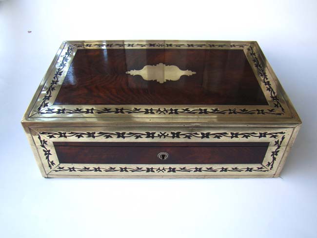 A magnificent early 19th century English brass mounted rosewood travelling dressing box circa 1810-1830.